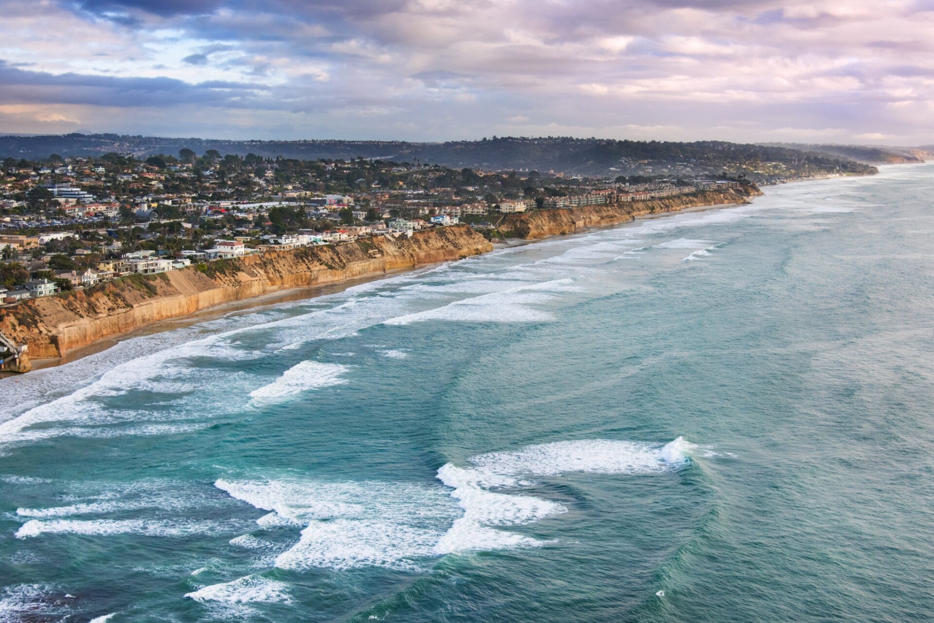 sky view of ocean meeting coastal cliffs